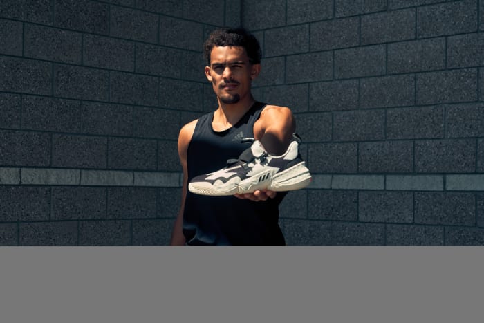 Trae Young wears his signature adidas basketball shoe in the 'SO SO DEF' colorway.